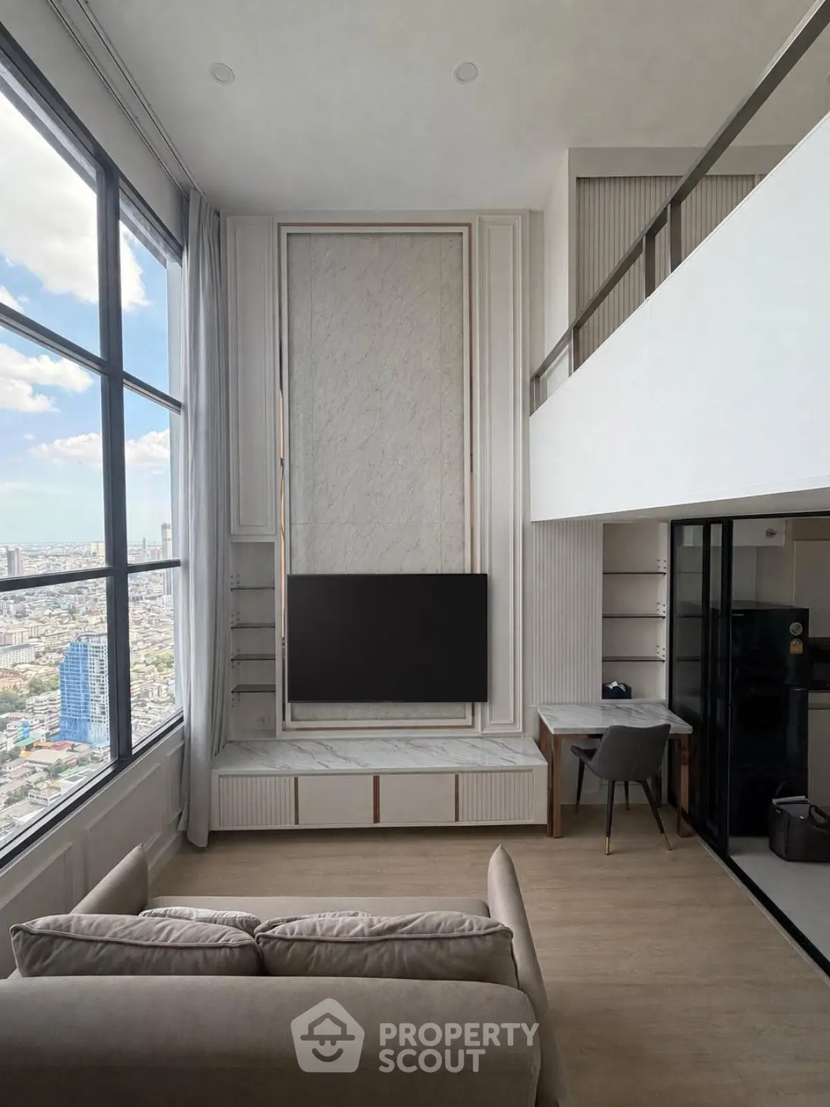 Luxurious high-rise living room with stunning city view and modern decor