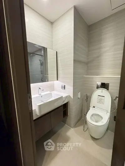 Modern bathroom with sleek fixtures and elegant design in a contemporary home.