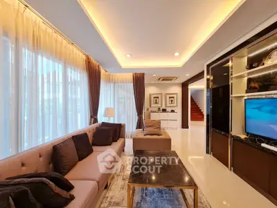 Luxurious modern living room with elegant lighting and stylish decor