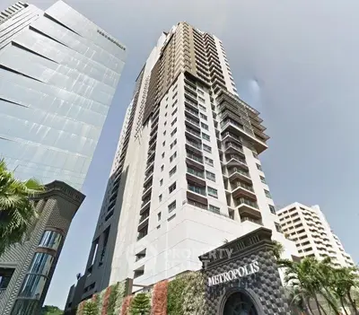 Stunning high-rise building with modern architecture in a prime urban location, perfect for luxury living.