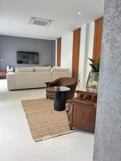 Luxurious modern living room with stylish furniture and elegant decor