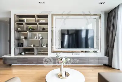 Luxurious modern living room with sleek TV unit and elegant decor