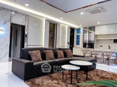 Luxurious modern living room with elegant decor and open kitchen layout