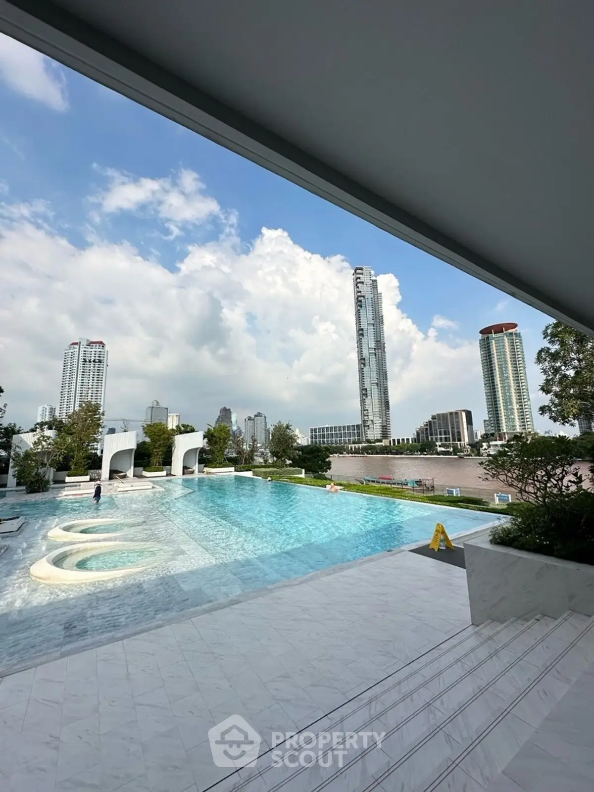 Luxurious rooftop pool with stunning city skyline views