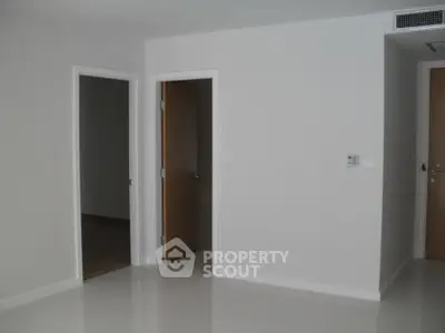 Minimalist interior with white walls and doors in a modern apartment