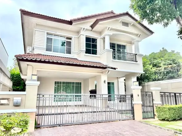 Stunning two-story house with elegant design and spacious balcony in a serene neighborhood.
