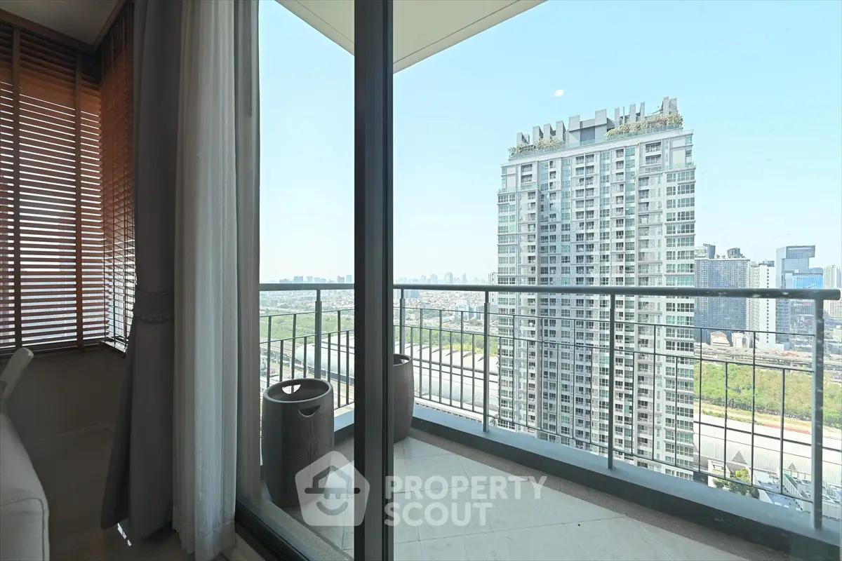 Stunning high-rise balcony view with cityscape and modern architecture