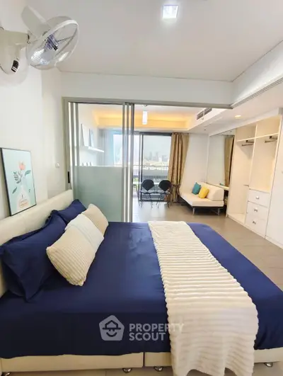 Modern bedroom with city view and stylish decor