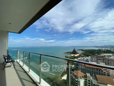 Stunning high-rise balcony with panoramic ocean view and cityscape