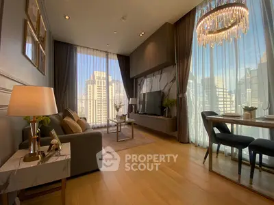 Luxurious living room with floor-to-ceiling windows and elegant chandelier in modern apartment.