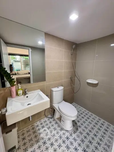 Modern bathroom with stylish tiles and sleek fixtures