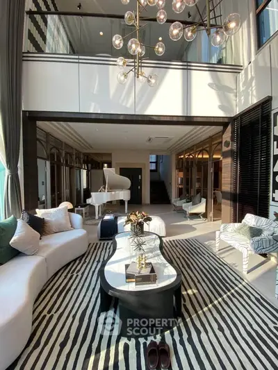 Luxurious living room with high ceiling and grand piano, elegant decor and modern lighting