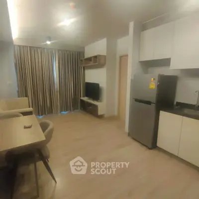 Modern apartment interior with open layout and stylish furnishings.