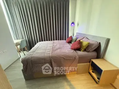 Modern bedroom with stylish decor and cozy ambiance