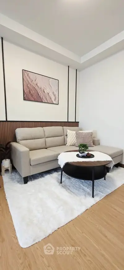 Modern living room with stylish decor and cozy seating area