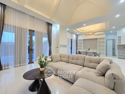 Luxurious modern living room with elegant decor and spacious seating area