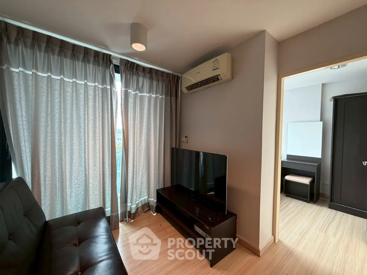 Modern living room with sleek furniture and natural light