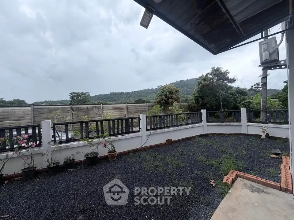 Spacious outdoor area with scenic mountain view and garden potential