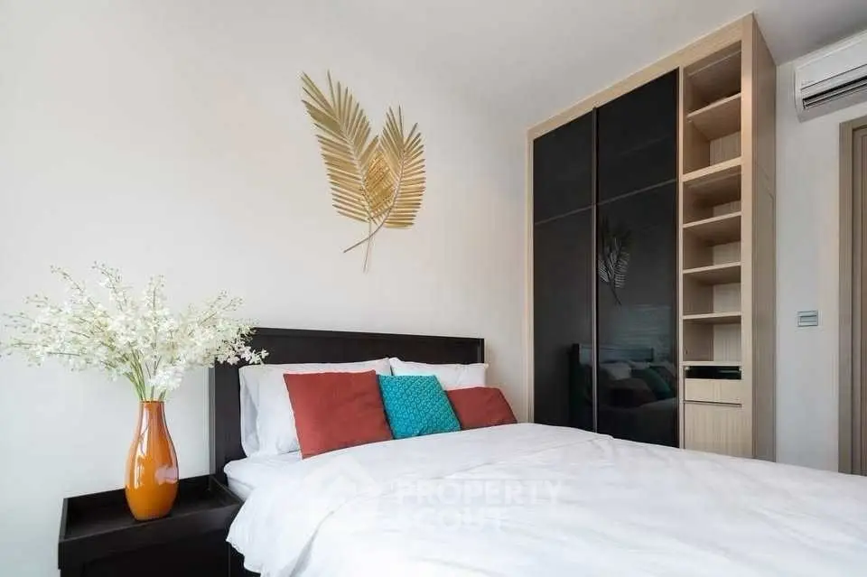 Modern bedroom with stylish decor and spacious wardrobe