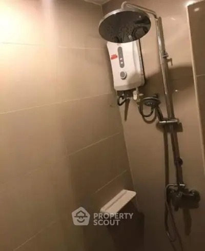 Modern bathroom with sleek shower and water heater