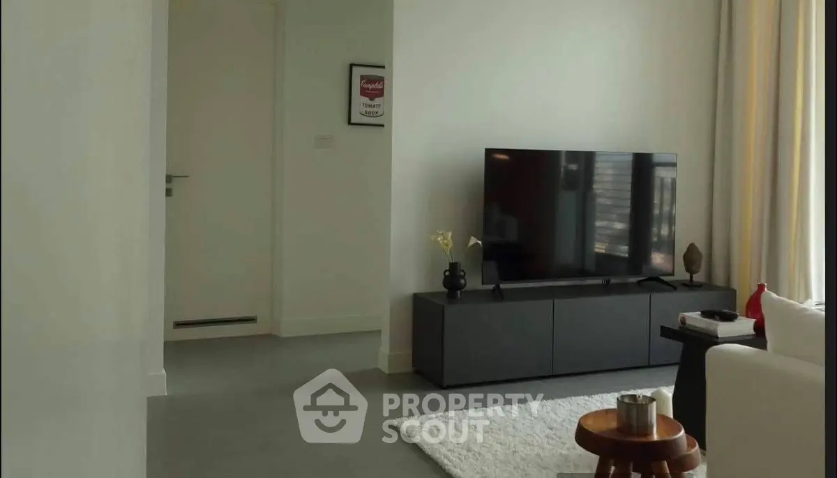 Modern living room with sleek TV setup and stylish decor