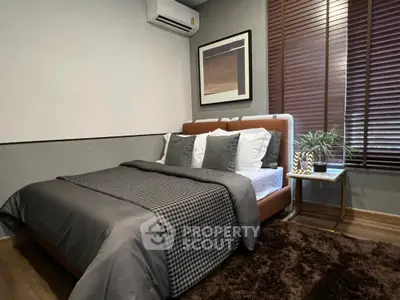 Cozy modern bedroom with stylish decor and natural light