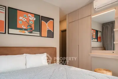 Modern bedroom with stylish decor and built-in wardrobe