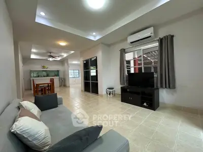 Spacious living room with modern decor and open layout
