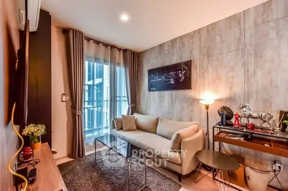 Modern living room with stylish decor and large window in urban apartment