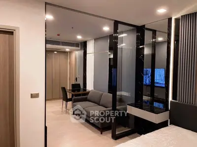 Modern living room with sleek design and stylish furniture in a contemporary apartment.