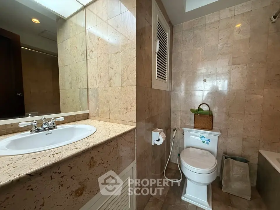 Luxurious marble bathroom with modern fixtures and elegant design