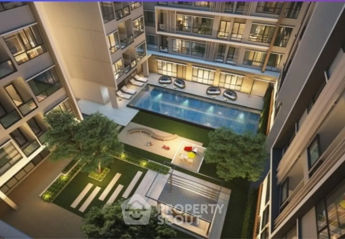 Luxurious apartment complex with pool and garden view from above.