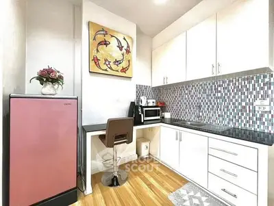 Modern kitchen with sleek cabinets and stylish backsplash