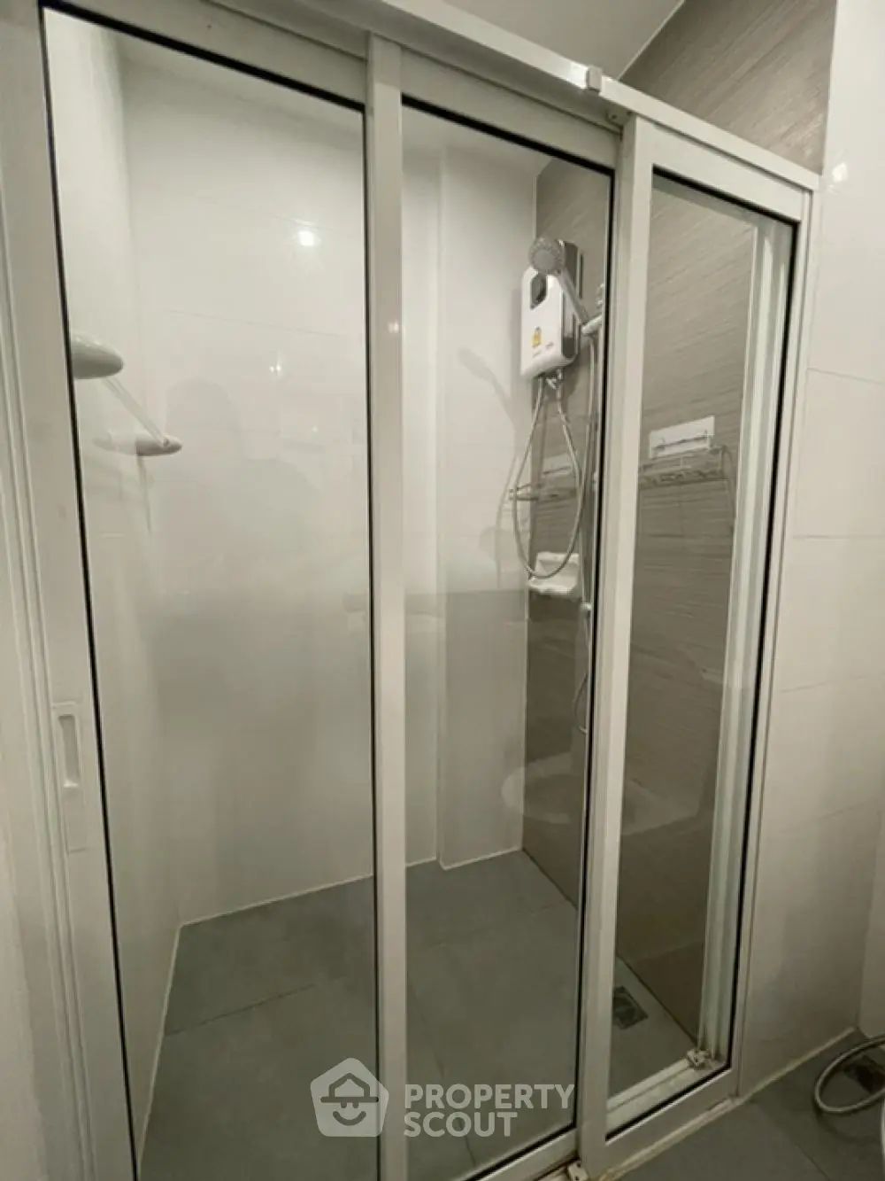 Modern bathroom with glass shower enclosure and sleek design