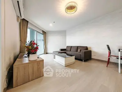 Spacious modern living room with elegant decor and natural light