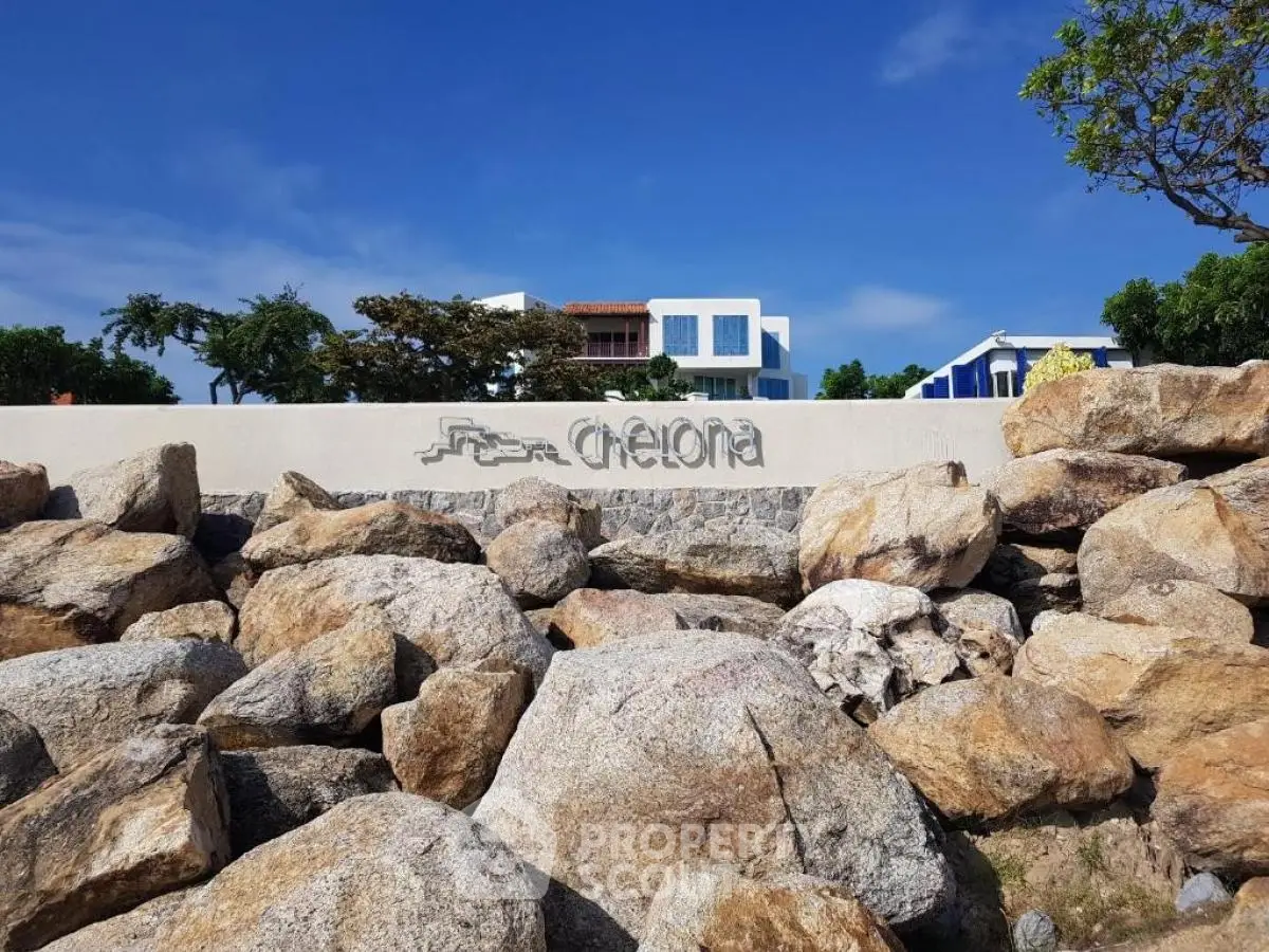 Stunning beachfront property with modern architecture and lush surroundings.