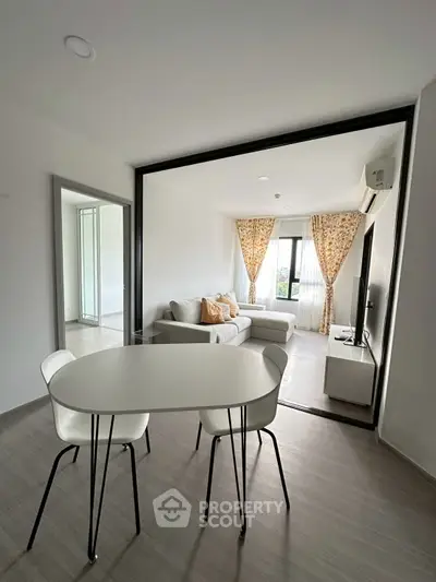 Modern living room with stylish furniture and natural light