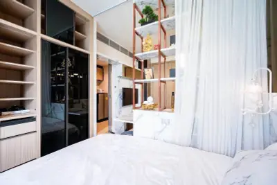 Modern bedroom with elegant shelving and cozy decor