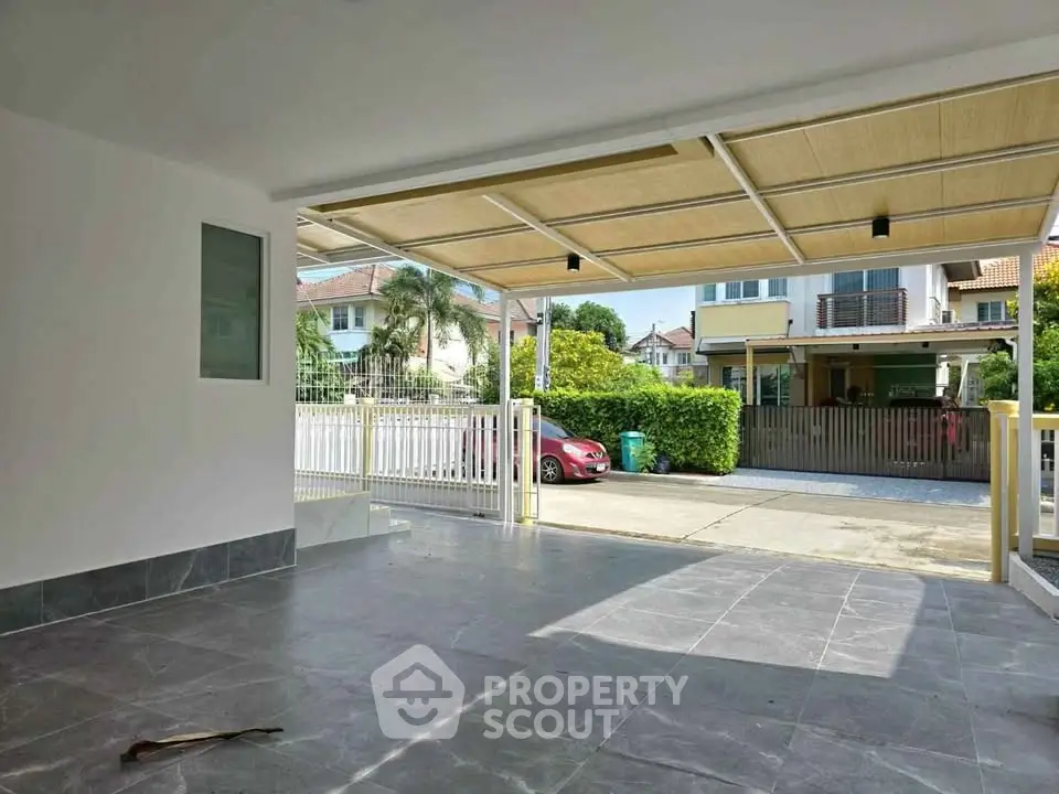Spacious garage with open view in suburban residential area