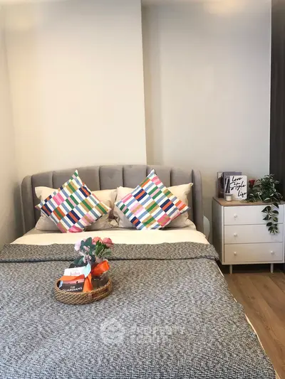 Cozy bedroom with stylish decor and modern furniture, perfect for relaxation.