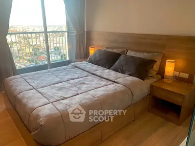 Cozy bedroom with city view and modern wooden furnishings