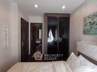 Modern bedroom with ensuite bathroom and stylish decor