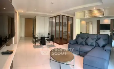 Spacious modern living room with elegant dining area and stylish furniture