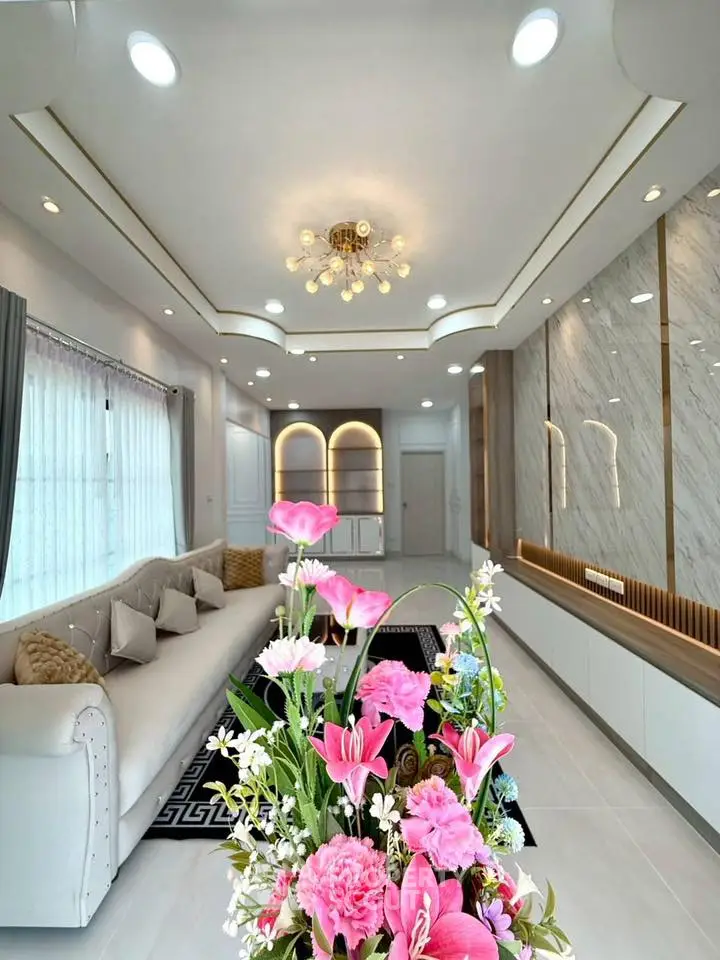 Luxurious living room with elegant decor and modern lighting