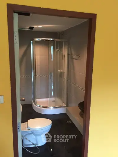 Modern bathroom with glass shower and sleek design