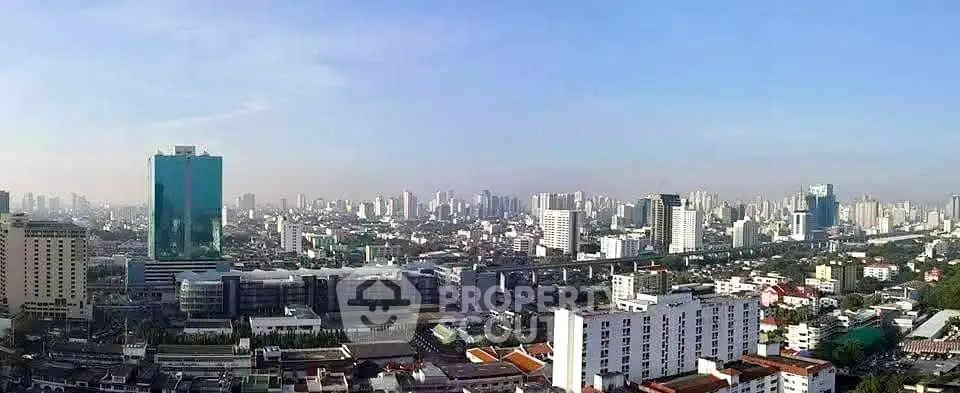 Stunning panoramic cityscape view showcasing modern skyscrapers and urban skyline.