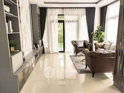 Luxurious living room with elegant furniture and large windows offering natural light.