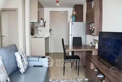 Modern compact living room with integrated kitchen and stylish decor