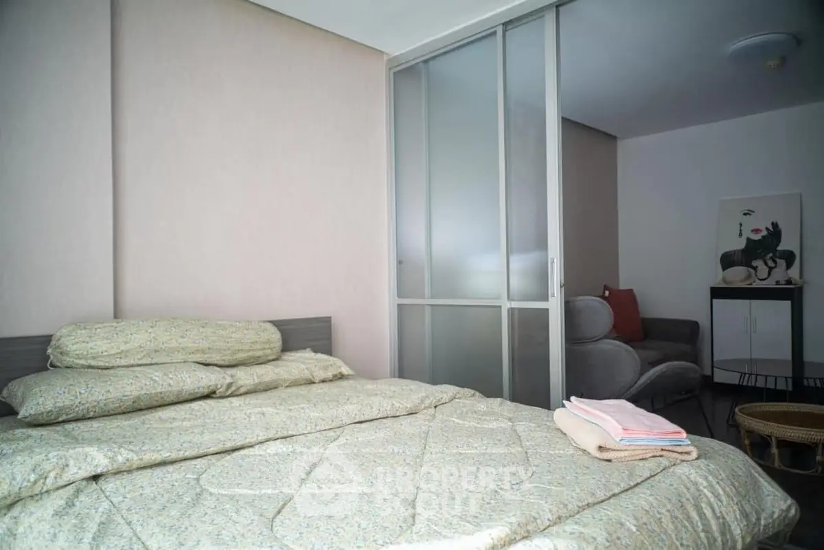 Cozy bedroom with modern sliding doors and stylish decor