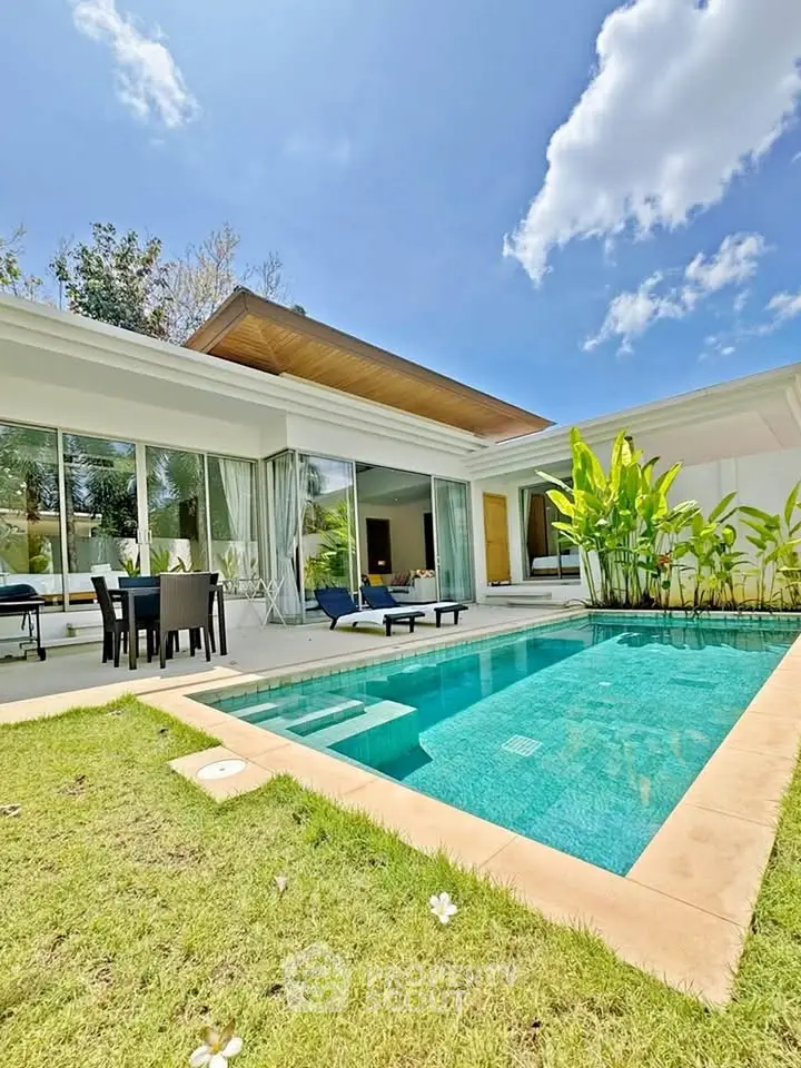 Luxurious modern villa with private pool and lush garden, perfect for serene living.